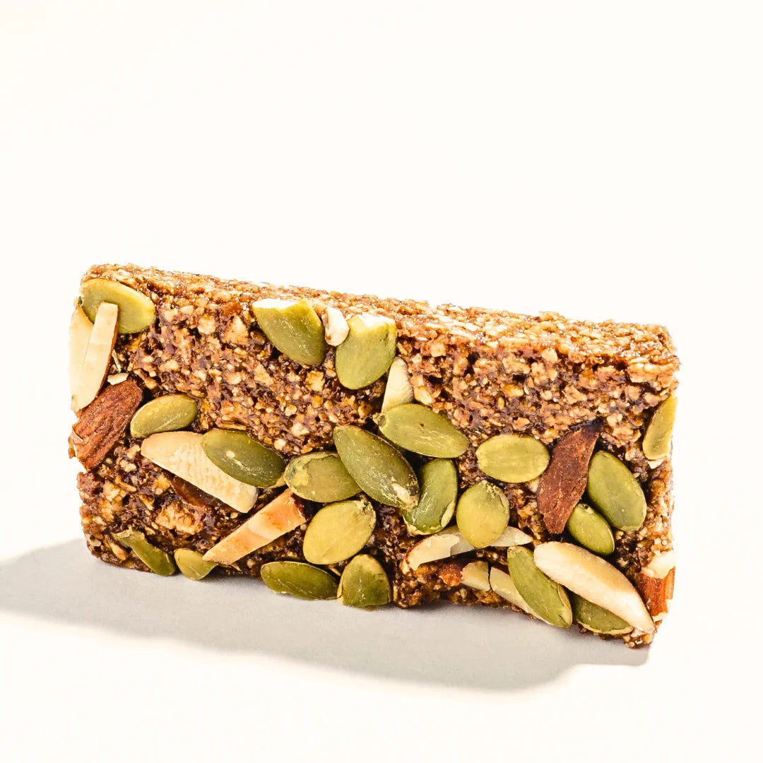 Coffee & Pumpkin Seed Granola Bar texture with visible seeds – Nibl Pakistan