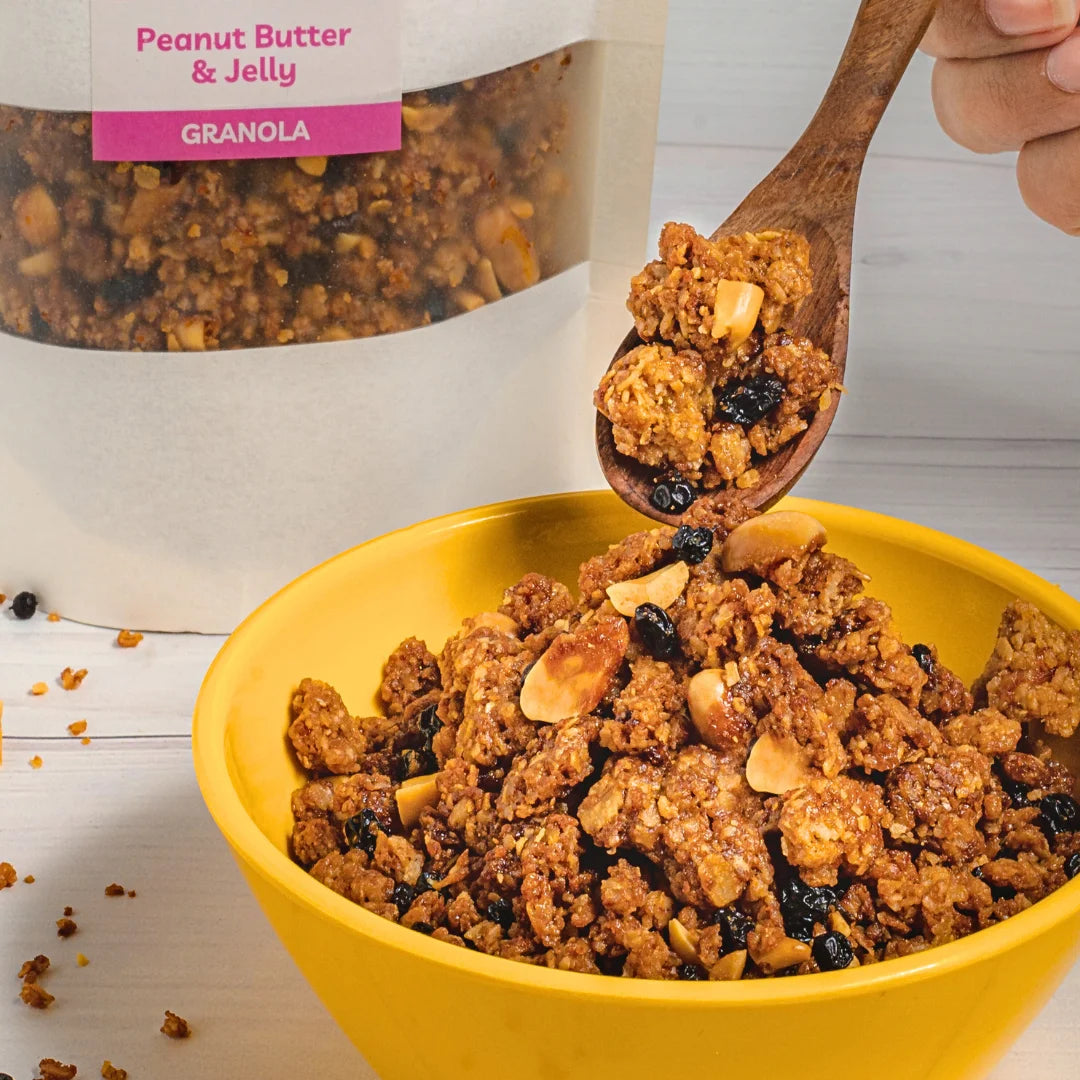Bowl of Nibl Peanut Butter Jelly Granola with milk – nourishing morning Pakistan